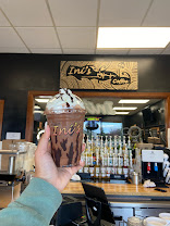Blended mocha held up in front of the counter